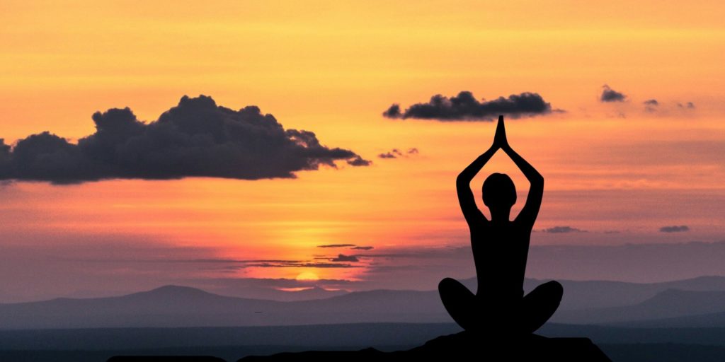 Female_meditating_on_base_chakra_Root_chakra_meditation 